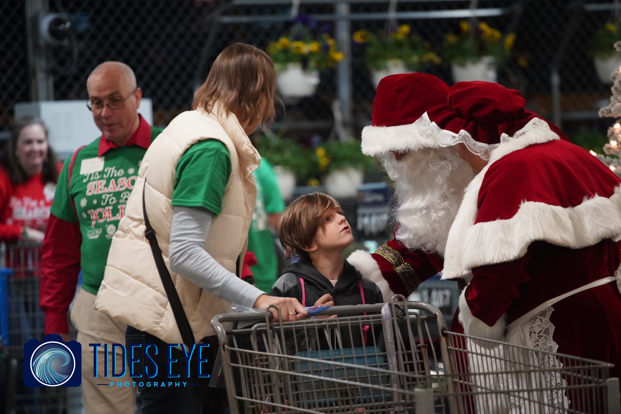 santa and mrs claus say hi to a kid