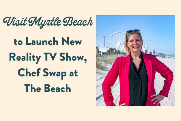 amanda freitag standing on the beach in a pink blazer with the skywheel in the background