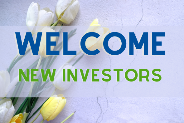 yellow and white tulips with words saying welcome new investors