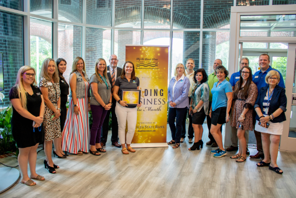 Herald Office Solutions Employees, Chamber Staff and ambassadors smile for photo